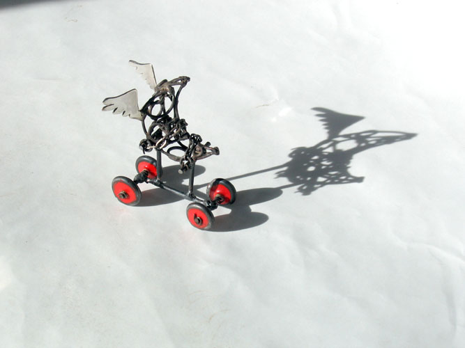 "Winged Moon on Four Wheels"